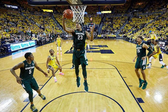 Zavier Simpson (3), Jordan Poole (2), Charles Matthews (1), and Ignas Brazdeikis (13)