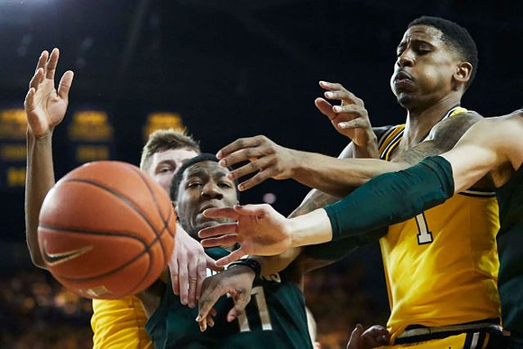Jon Teske (15) and Charles Matthews (1)