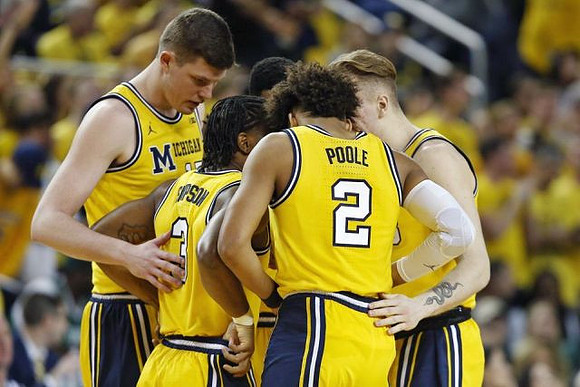 Jon Teske (15), Zavier Simpson (3), Charles Matthews (1), Jordan Poole (2), and Ignas Brazdeikis (13)