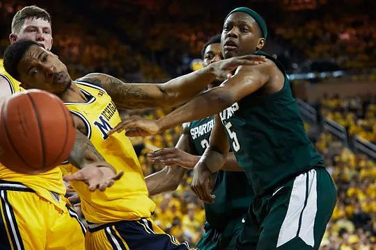 Charles Matthews (1) and Jon Teske (15)