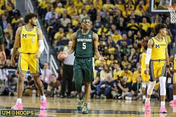 Isaiah Livers (4) and Jordan Poole (2)
