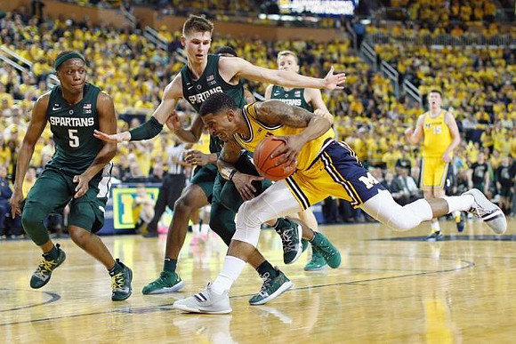 Charles Matthews (1) and Jon Teske (15)