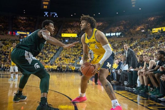 Isaiah Livers (4) and Charles Matthews (1)