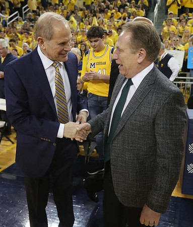 John Beilein and Michigan State Head Coach Tom Izzo