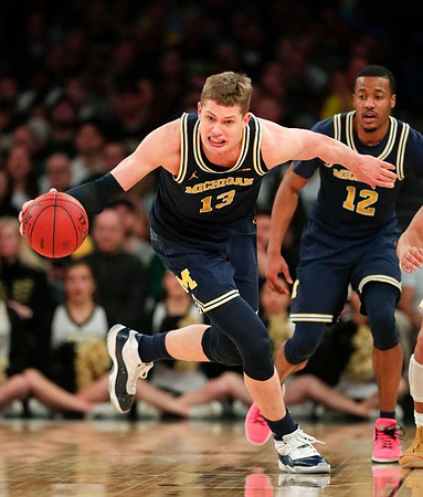 Moritz Wagner (13) and Muhammad-Ali Abdur-Rahkman (12)