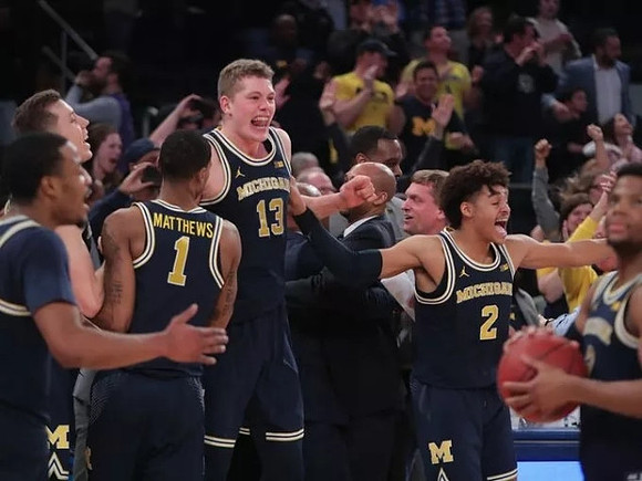 Muhammad-Ali Abdur-Rahkman (12), Duncan Robinson (22), Charles Matthews (1), Moritz Wagner (13), Jordan Poole (2), and Zavier Simpson (3)