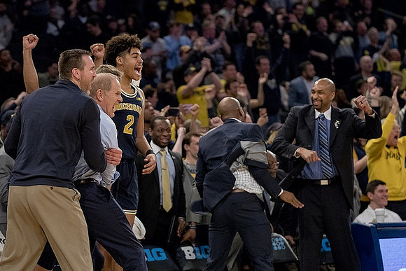 John Beilein, Jordan Poole (2), Deandre Haynes, and Saddi Washington
