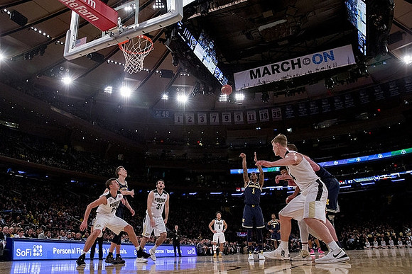 Duncan Robinson (22) and Charles Matthews (1)