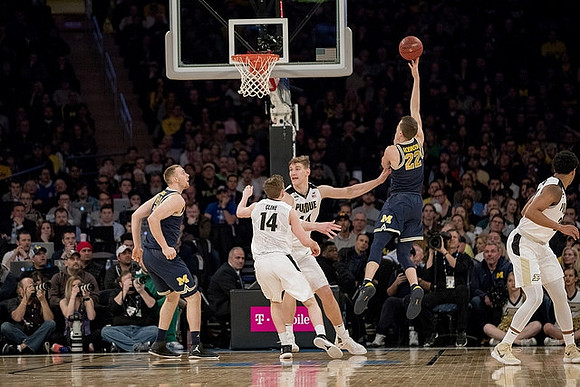 Austin Davis (51) and Duncan Robinson (22)