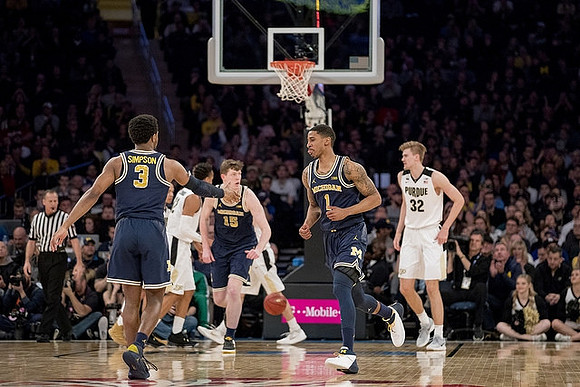Zavier Simpson (3), Jon Teske (15), and Charles Matthews (1)