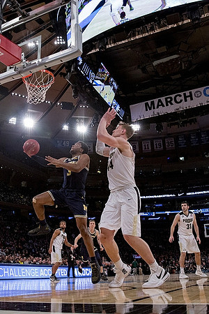Zavier Simpson (3) and Duncan Robinson (22)