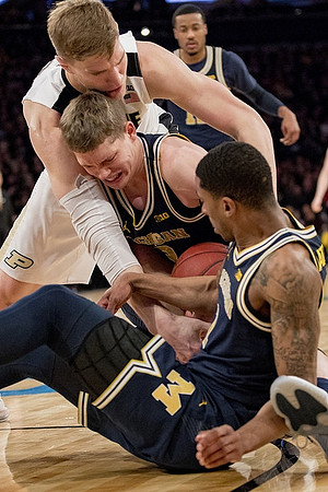 Charles Matthews (1), Moritz Wagner (13), and Muhammad-Ali Abdur-Rahkman (12)