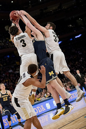 Jon Teske (15) and Duncan Robinson (22)