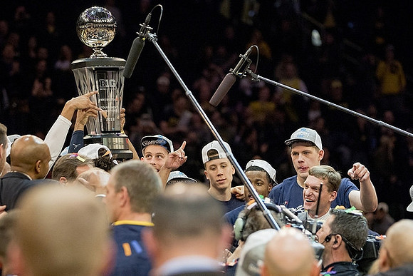 Michigan Team and Big Ten Tournament Trophy