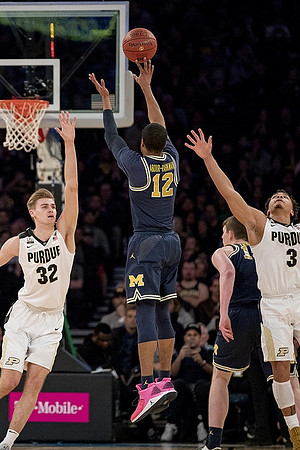 Muhammad-Ali Abdur-Rahkman (12) and Jon Teske (15)