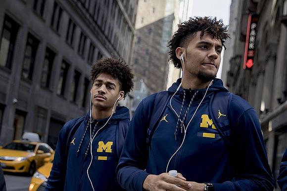 Jordan Poole (2) and Isaiah Livers (4)