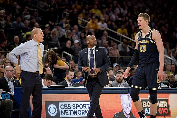 John Beilein, Deandre Haynes, and Moritz Wagner (13)