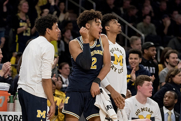 Eli Brooks (55), Jordan Poole (2), Ibi Watson (23), and Jon Teske (15)