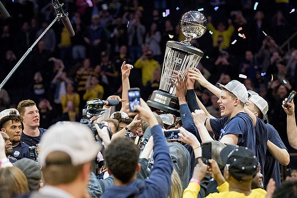 Michigan Team and Big Ten Tournament Trophy