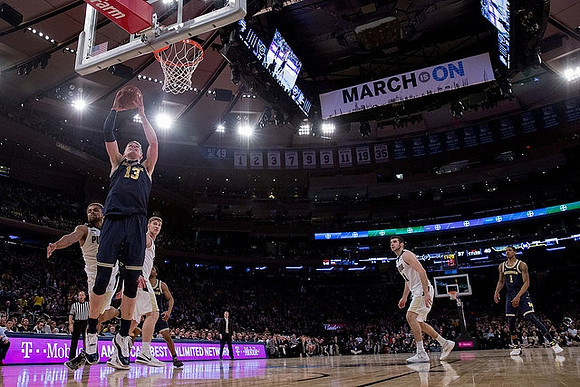 Moritz Wagner (13) and Charles Matthews (1)