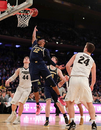 Muhammad-Ali Abdur-Rahkman (12) and Jon Teske (15)