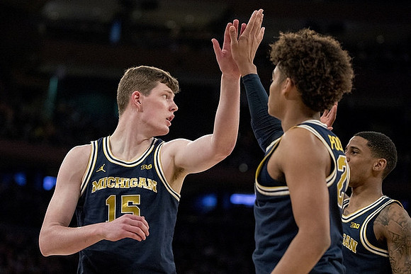 Jon Teske (15), Jordan Poole (2), and Charles Matthews (1)