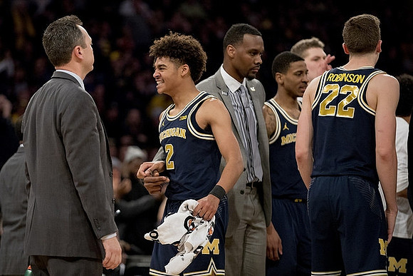 Jordan Poole (2), Charles Matthews (1), Moritz Wagner (13), and Duncan Robinson (22)