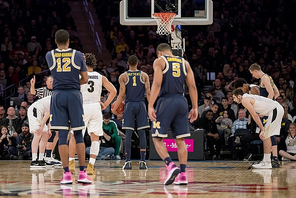 Muhammad-Ali Abdur-Rahkman (12), Charles Matthews (1), Jaaron Simmons (5), and Duncan Robinson (22)