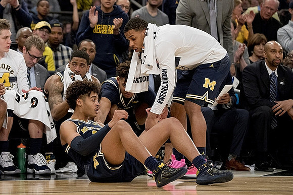 Moritz Wagner (13), Charles Matthews (1), Jordan Poole (2), Jaaron Simmons (5), and Saddi Washington
