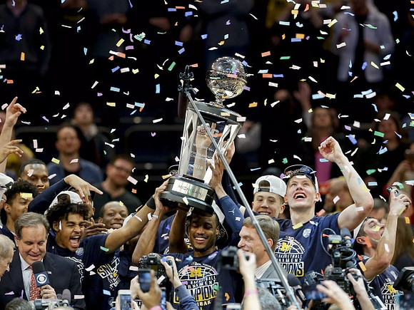 Michigan Team and Big Ten Tournament Trophy