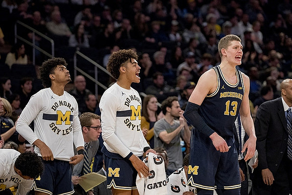 Eli Brooks (55), Ibi Watson (23), Jordan Poole (2), and Moritz Wagner (13)