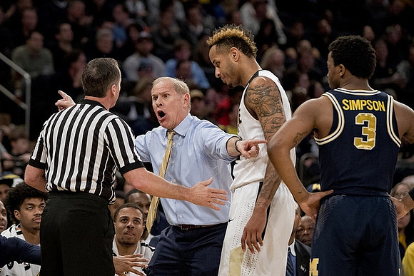 John Beilein and Zavier Simpson (3)