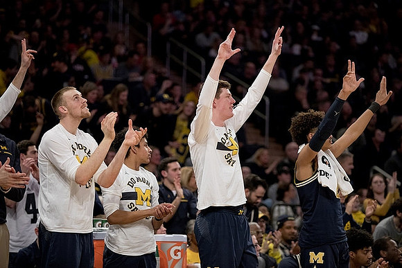 Austin Davis (51), Eli Brooks (55), Jon Teske (15), and Jordan Poole (2)