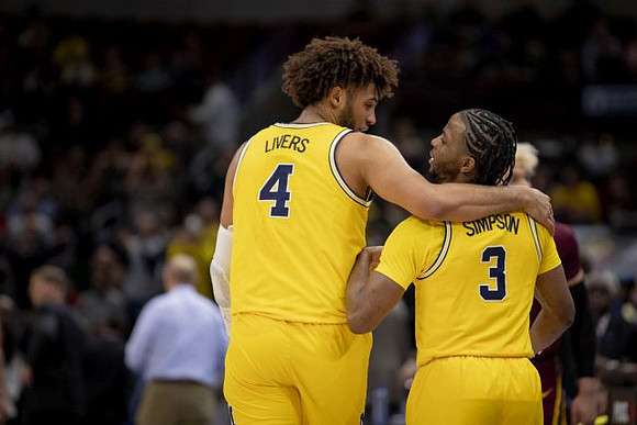Isaiah Livers (4) and Zavier Simpson (3)