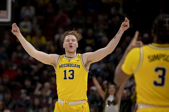 Ignas Brazdeikis (13) and Zavier Simpson (3)