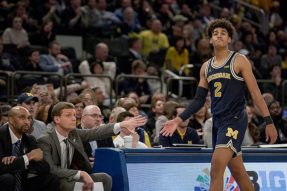 Saddi Washington, Luke Yaklich, and Jordan Poole (2)