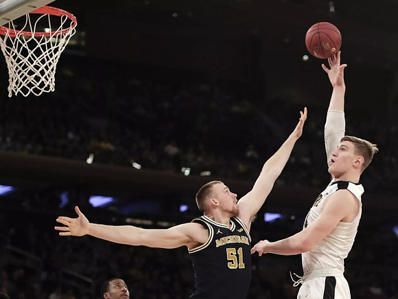 Muhammad-Ali Abdur-Rahkman (12) and Austin Davis (51)