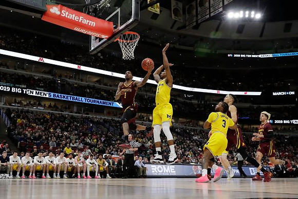 Charles Matthews (1) and Zavier Simpson (3)