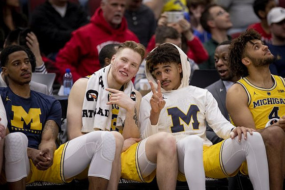 Charles Matthews (1), Ignas Brazdeikis (13), Jordan Poole (2), and Isaiah Livers (4)