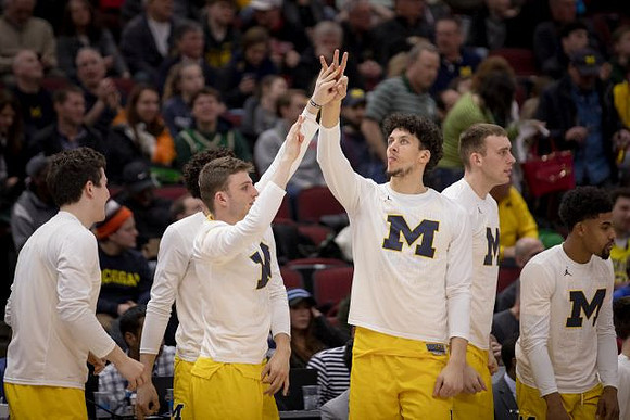 C.J. Baird (24), Luke Wilson (32), Brandon Johns Jr. (23), Austin Davis (51), and David DeJulius (0)
