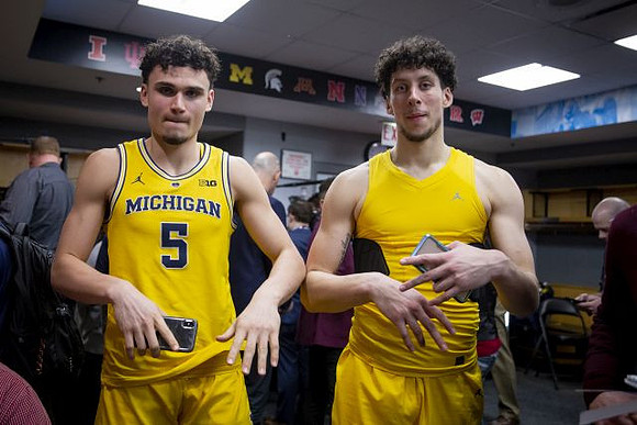 Adrien Nunez (5) and Brandon Johns Jr. (23)