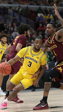 Isaiah Livers (4) and Zavier Simpson (3)