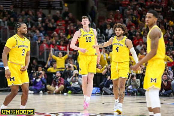 Zavier Simpson (3), Jon Teske (15), Isaiah Livers (4), and Charles Matthews (1)