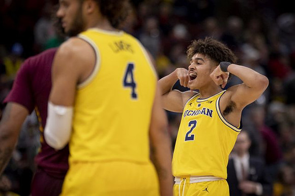 Isaiah Livers (4) and Jordan Poole (2)
