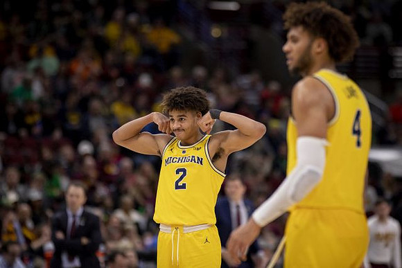 Jordan Poole (2) and Isaiah Livers (4)