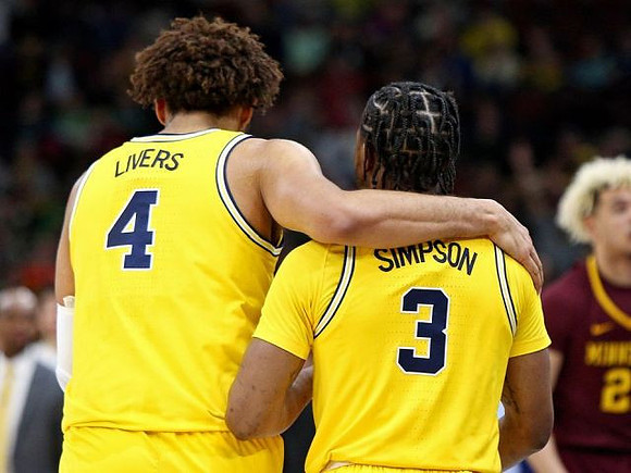 Isaiah Livers (4) and Zavier Simpson (3)