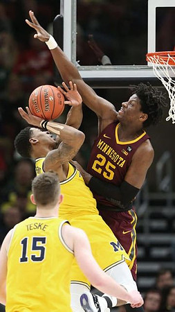 Charles Matthews (1) and Jon Teske (15)