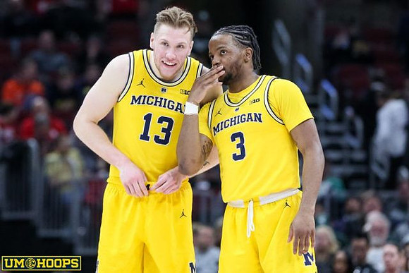 Ignas Brazdeikis (13) and Zavier Simpson (3)