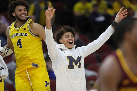 Isaiah Livers (4) and Jordan Poole (2)