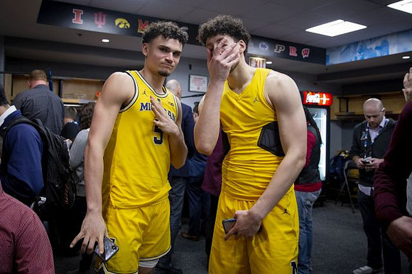 Adrien Nunez (5) and Brandon Johns Jr. (23)